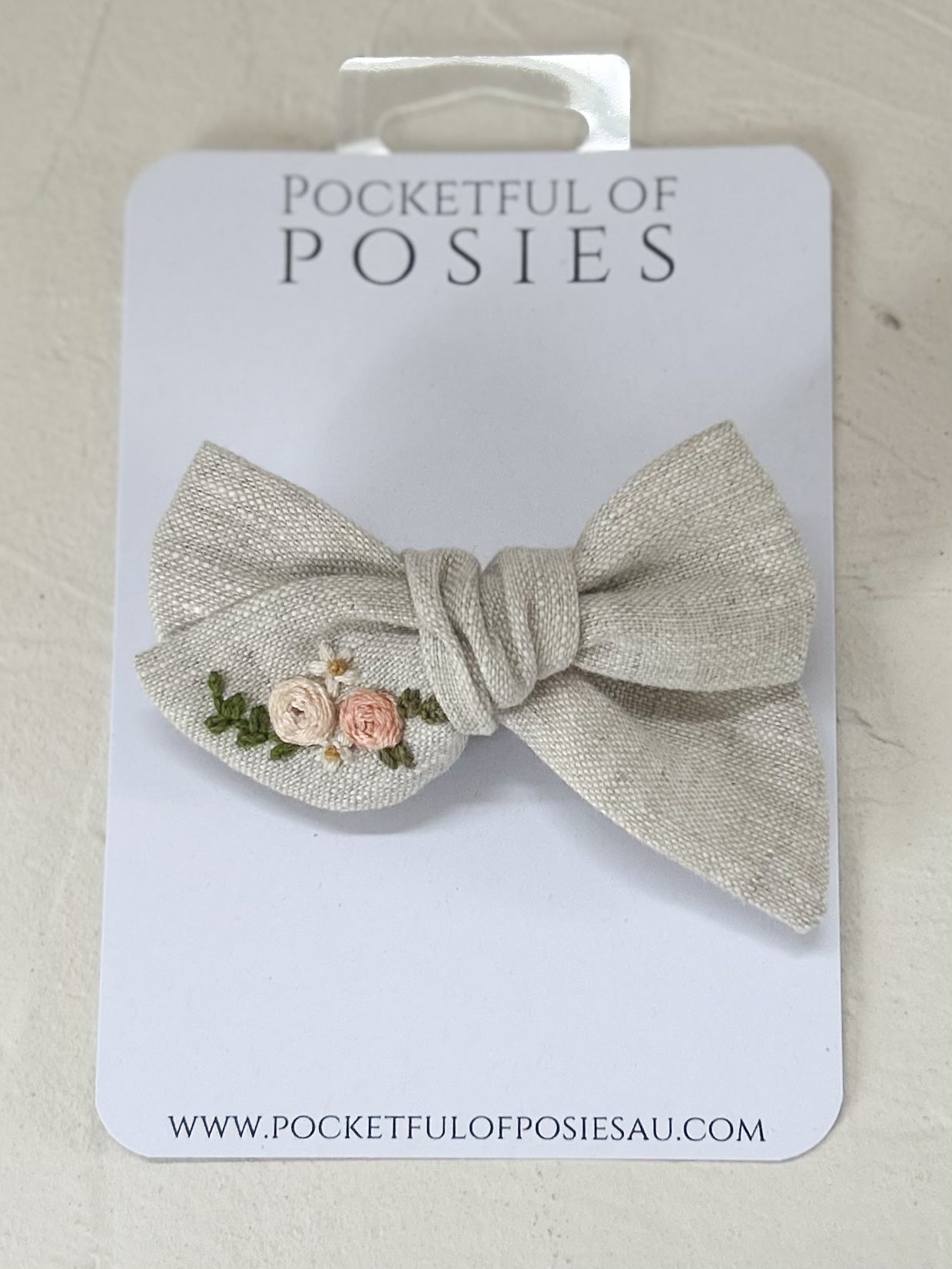Stone Linen Evie Bow with Blush Pink roses and daisies